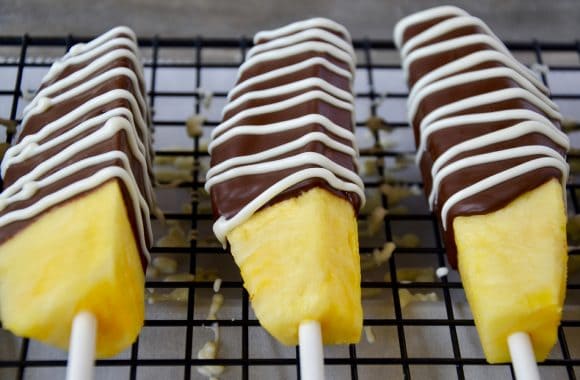 chocolate dipped pineapple on a stick