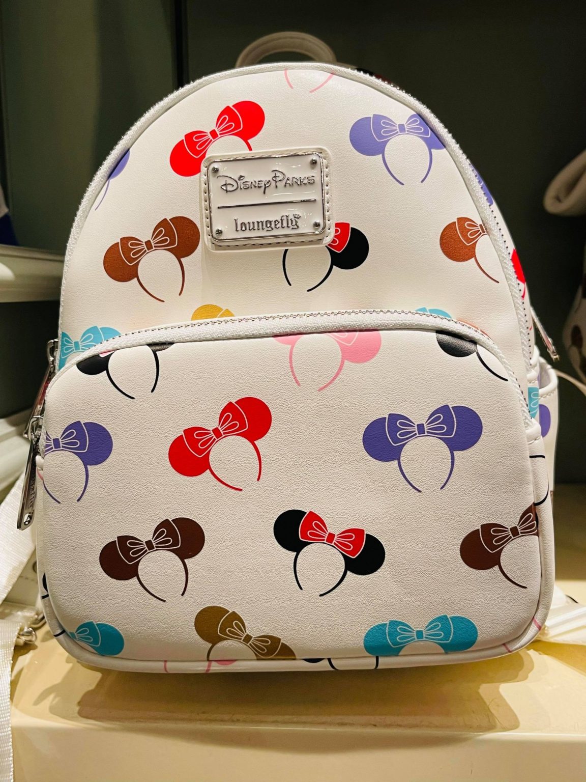 This NEW Loungefly Backpack Doubles as a Carrier for Your Mouse Ears ...