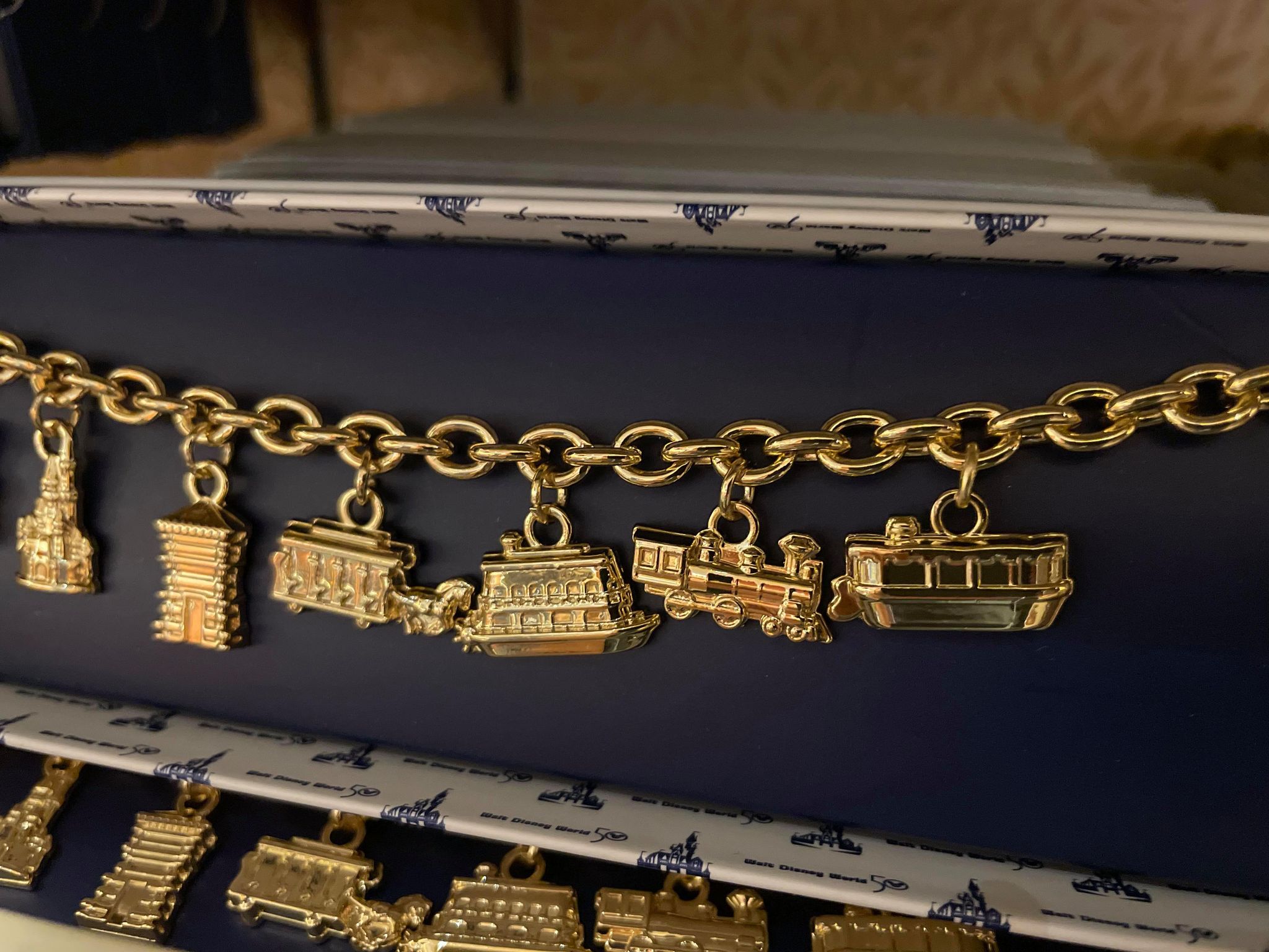 PHOTOS: New Vault Collection Ride Vehicle Charm Bracelet Available at Walt  Disney World - WDW News Today