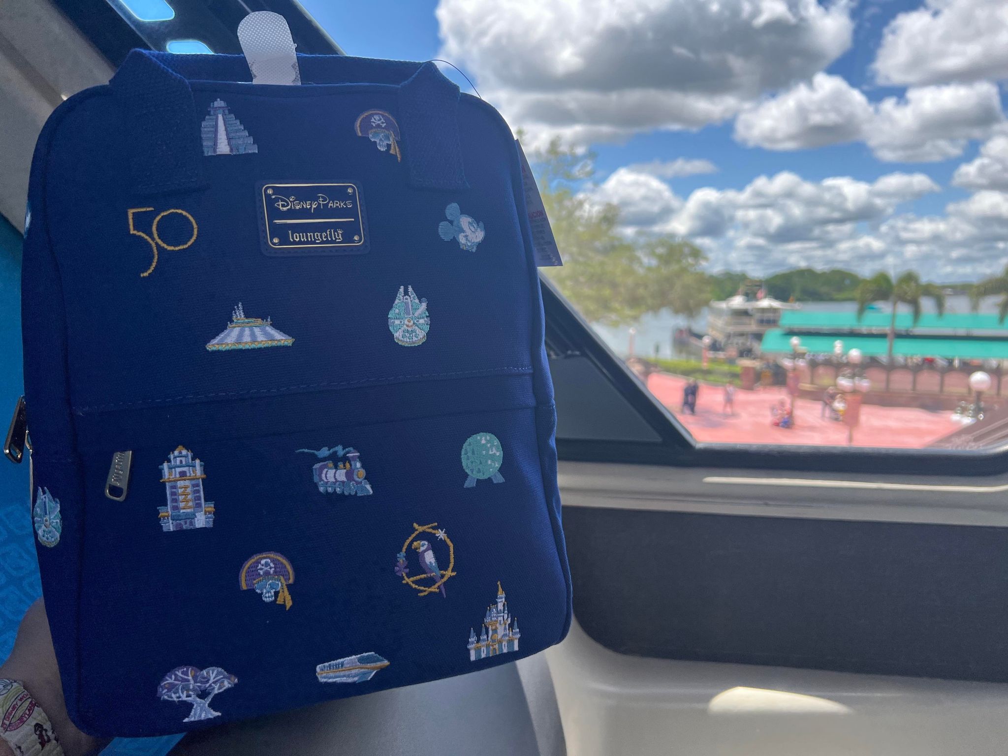 PHOTOS: 50th Anniversary EARidescent Loungefly Backpack Arrives at Walt  Disney World - WDW News Today