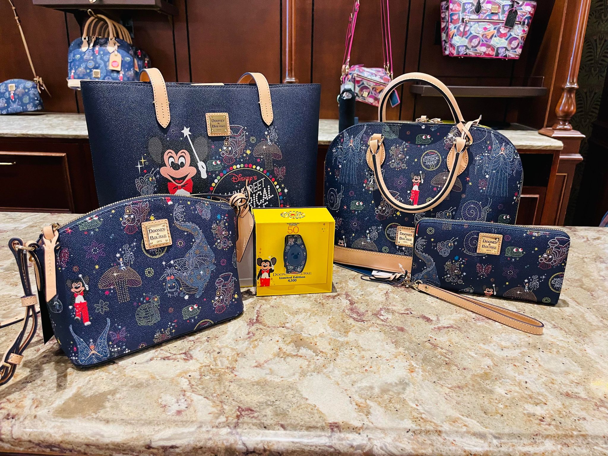 Main Street Electrical Parade Dooney & Bourke Collection Now at Uptown  Jewelers 