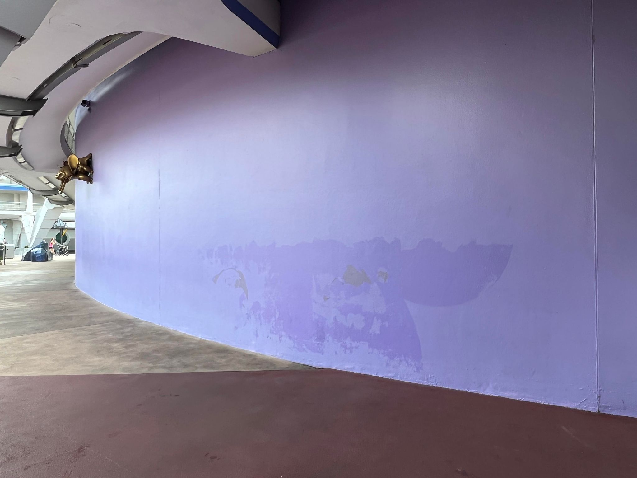 purple wall pride mural gone