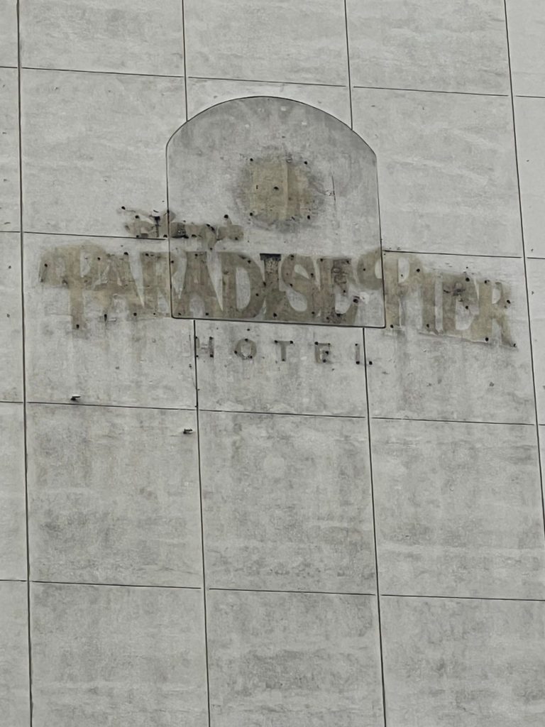 Paradise Pier Hotel sign removed close up x2