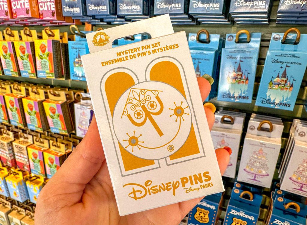 small world mystery pin set