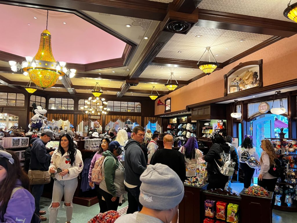 Crowds Swarm Disneyland Emporium for 100th Merchandise