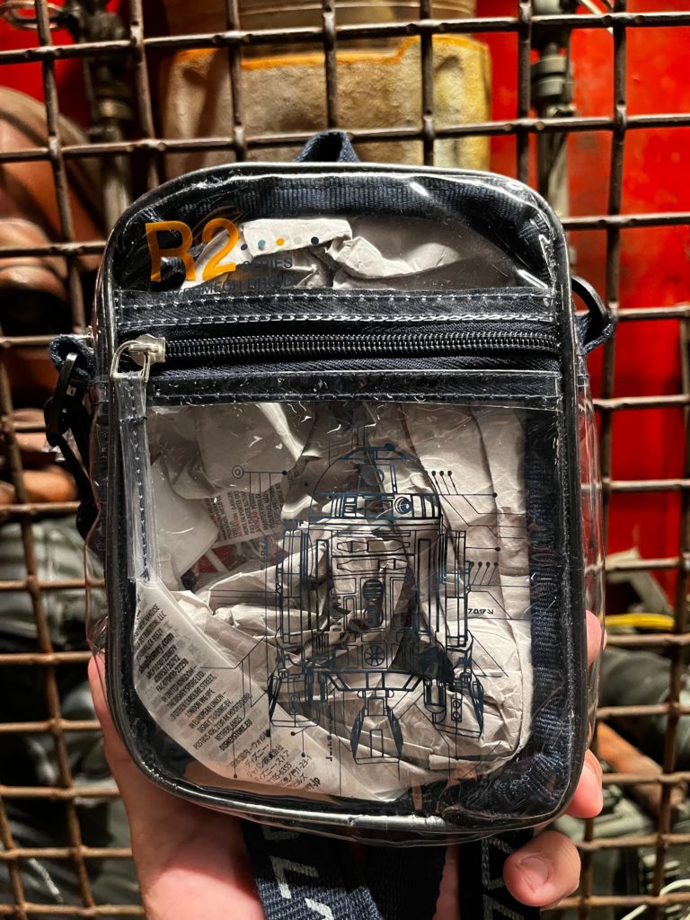 R6-LTBD is ready for anything! As much as I love my Little Buddy, I  couldn't see myself spending $35 for a droid backpack, so I got a $5  Goodwill messenger bag instead! : r/GalaxysEdge