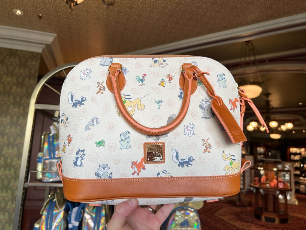 shopDisney - Iconic & classic. Princess Dooney & Bourke bags are here.