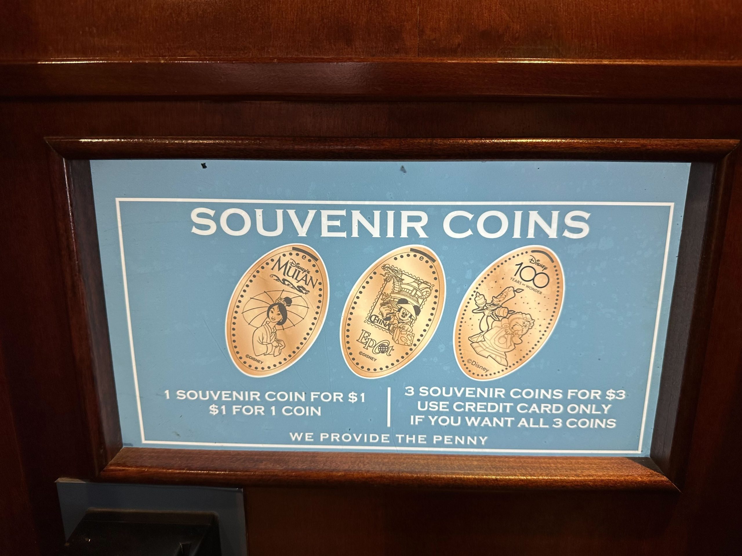 Disney100 pressed penny at world traveler in Epcot