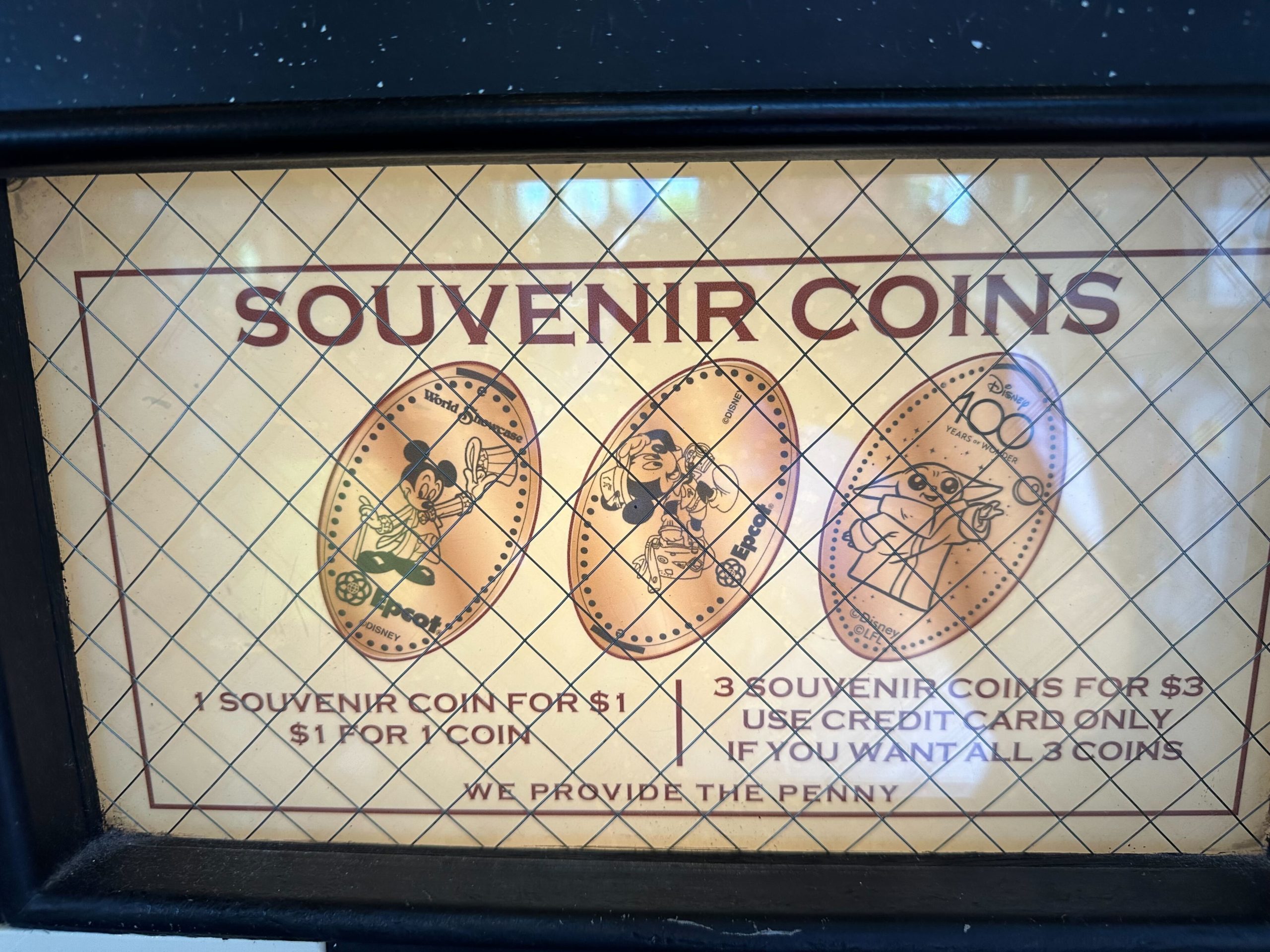 Disney 100 pressed penny at port of entry at Epcot