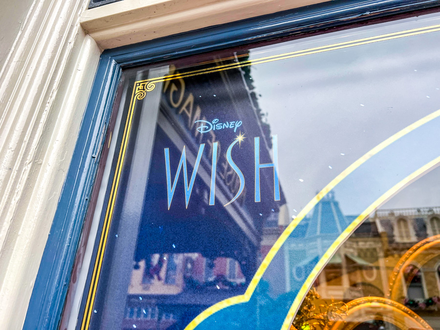 Magic Kingdom Emporium Wish Movie Window Displays Merch