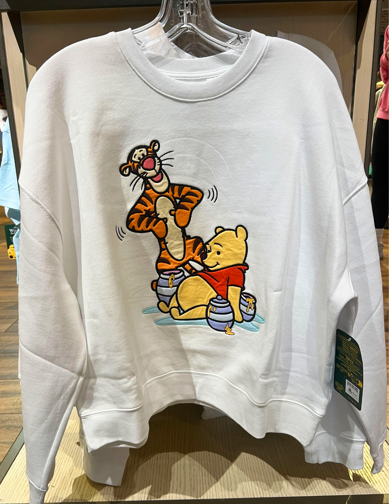 New 1990s-Inspired Winnie the Pooh Sweaters and Crocs Arrive at Disneyland  Resort - WDW News Today