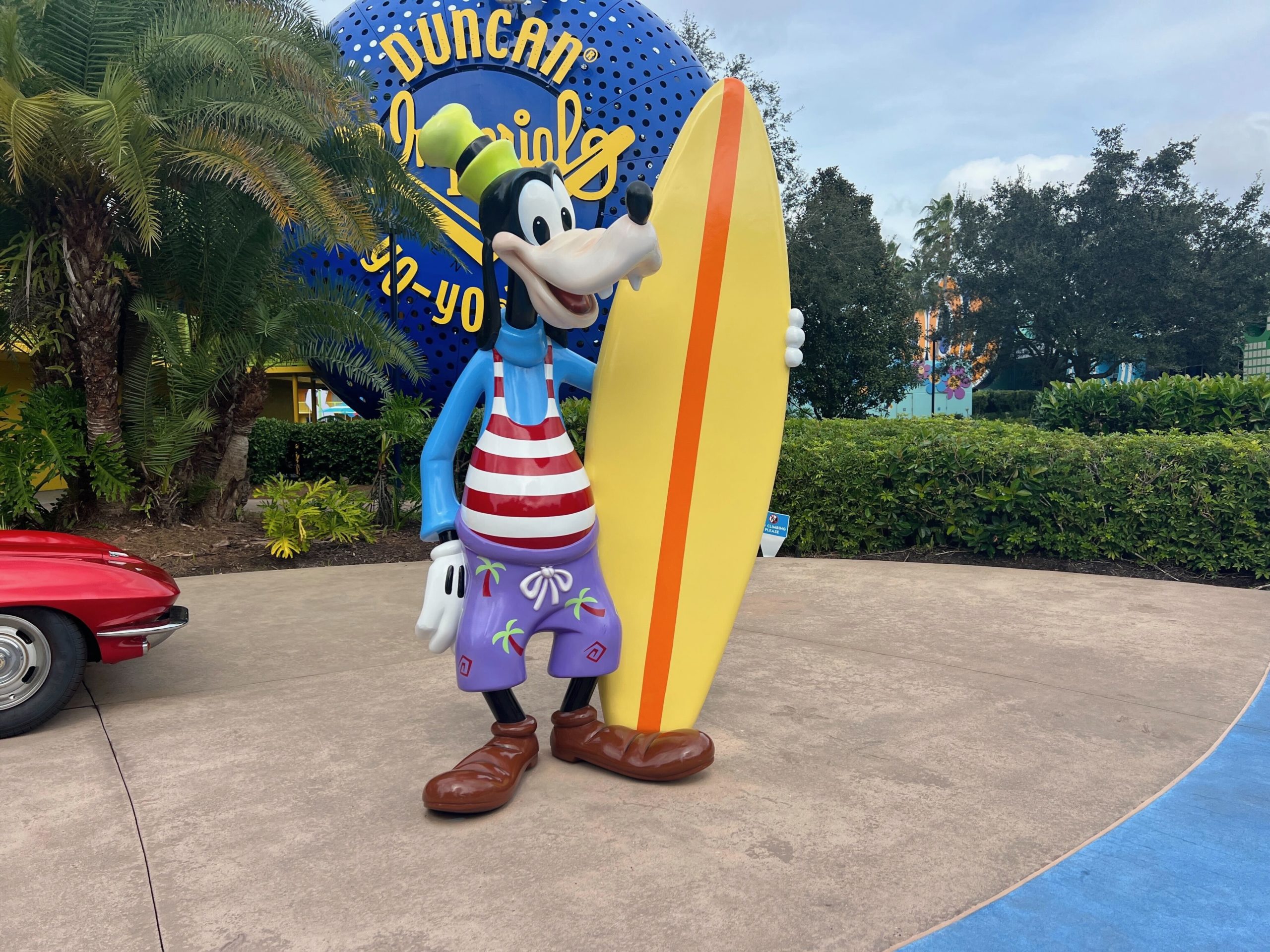 Repainted Surfer Goofy Statue with Surfboard at Pop Century Resort