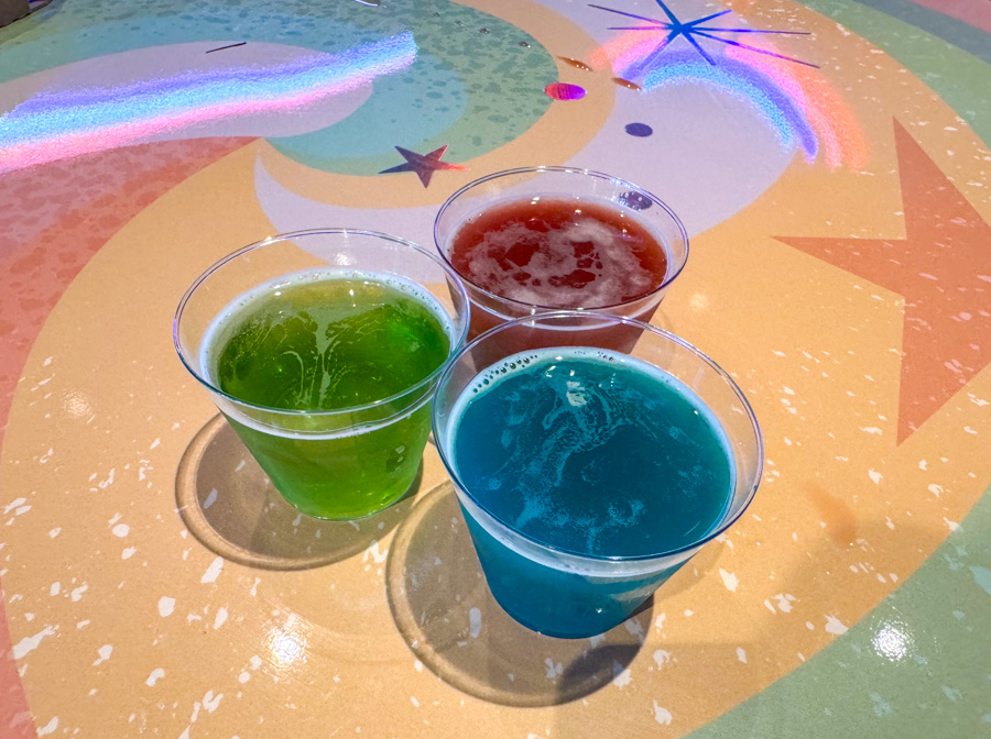 2024 EPCOT International Festival of the Arts Figments Inspiration Station The Odyssey Rainbow Beer Flight