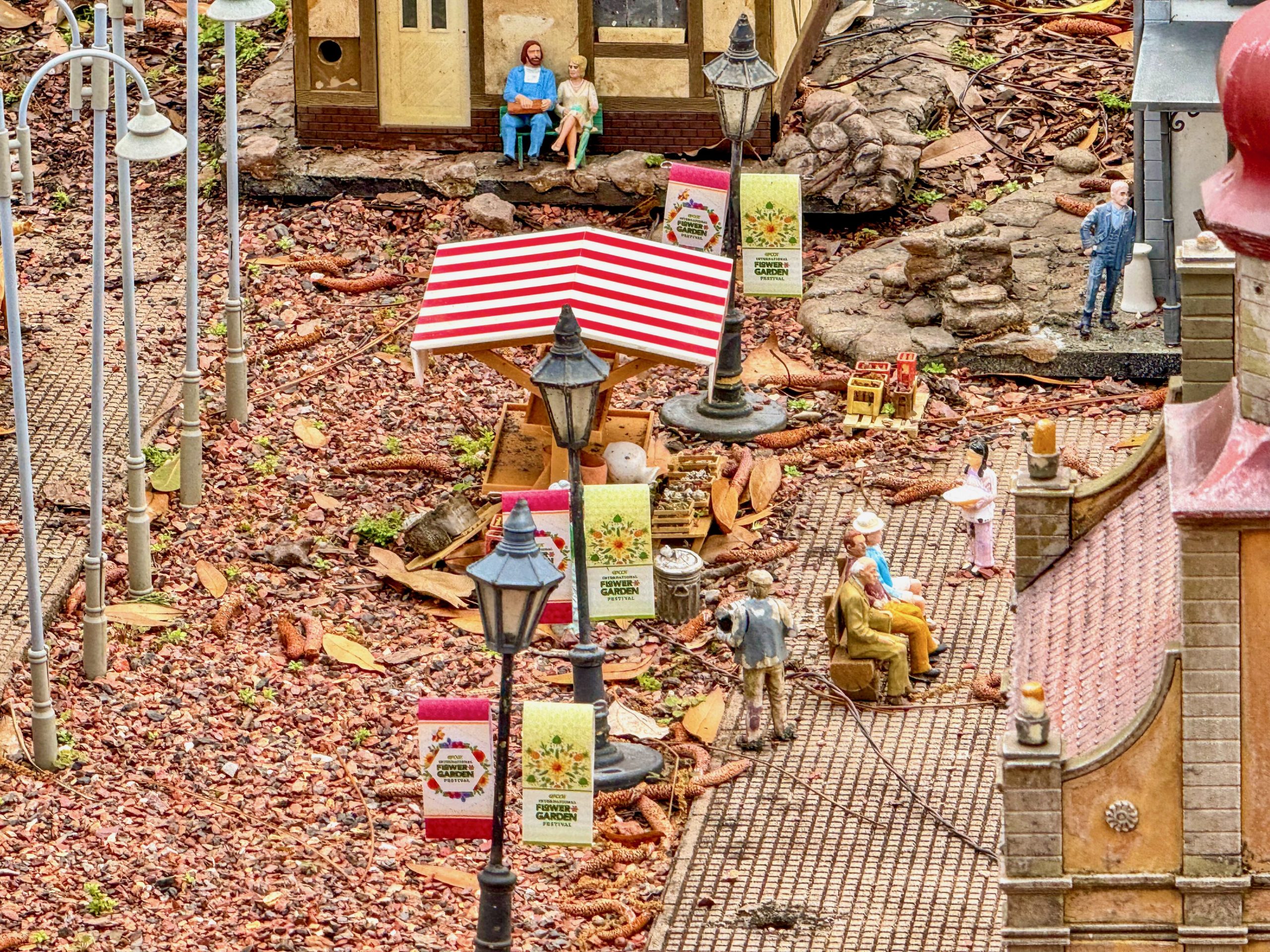 Tiny Train Village Celebrate's EPCOT's 2024 Flower & Garden Festival Banners