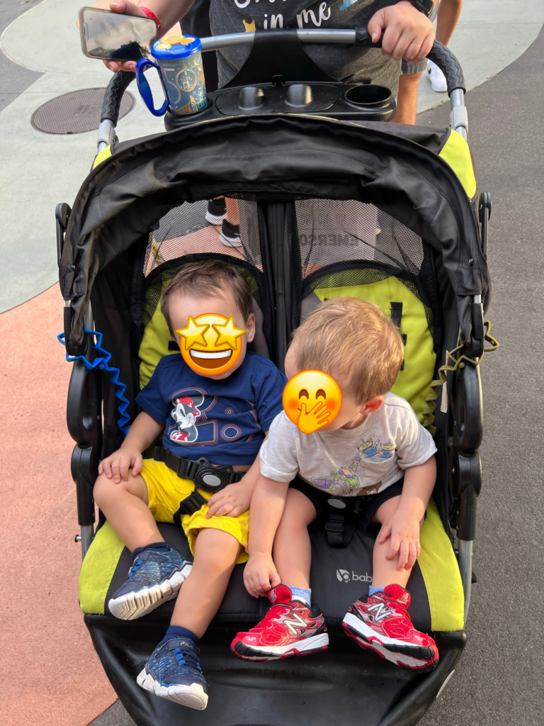Double Jogging Stroller at Disney Springs emoji faces