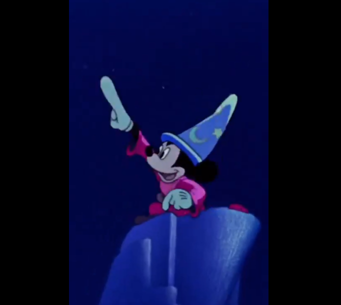 sorcerer mickey pointing to the stars