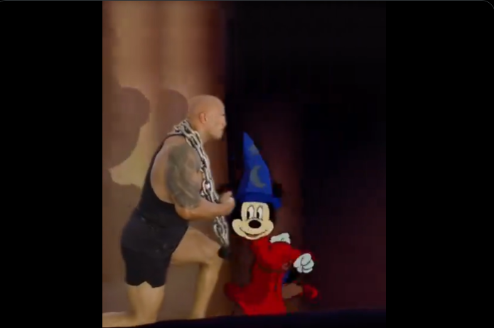 the rock doing squats with sorcerer mickey